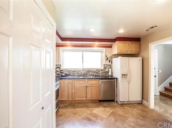Travertine floors, with water etched accents