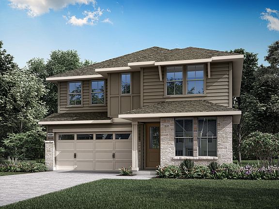 A two-story residential house with a garage, surrounded by lush greenery and a well-manicured lawn,