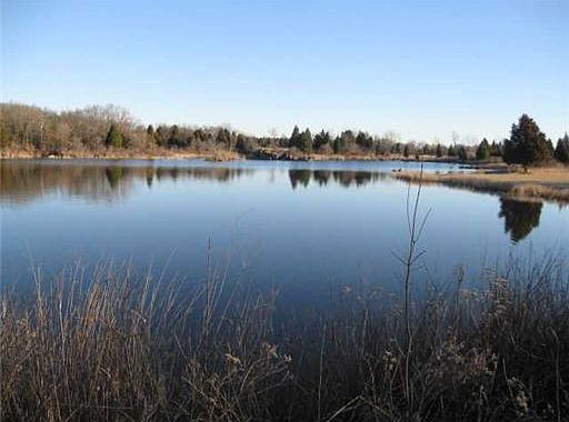 5 ACRE STOCKED VIEW FROM DAM APPROX. 25' DEEP