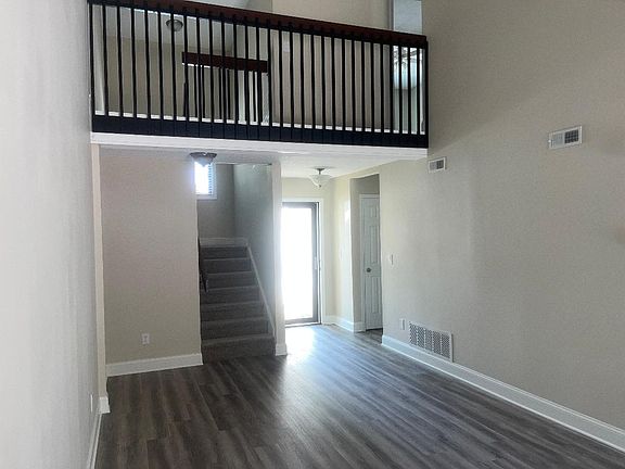 Second level balcony overlooking living area