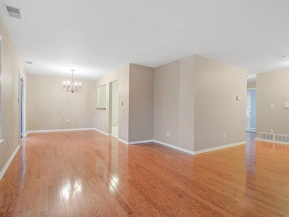 Open foyer entry, living/family & dining rooms