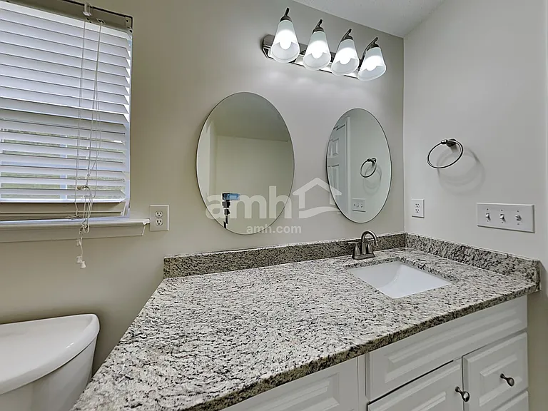 219 Bellport Dr — Photo 11