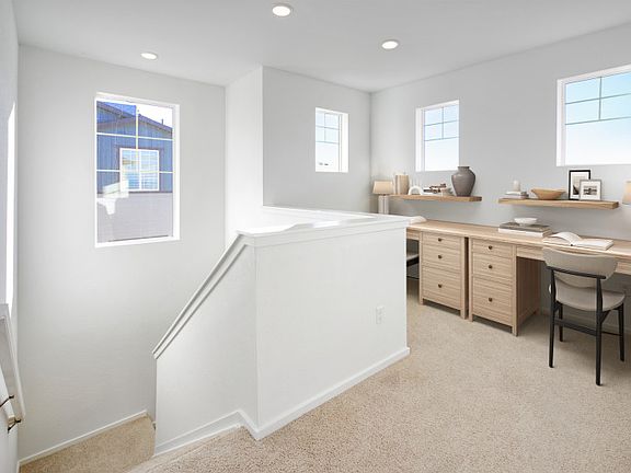 Head upstairs to find a quaint loft that s perfect for an additional office space!