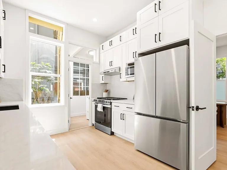 Brand new chefs kitchen with gas stove, dishwasher and tons of cabinets (virtually staged)