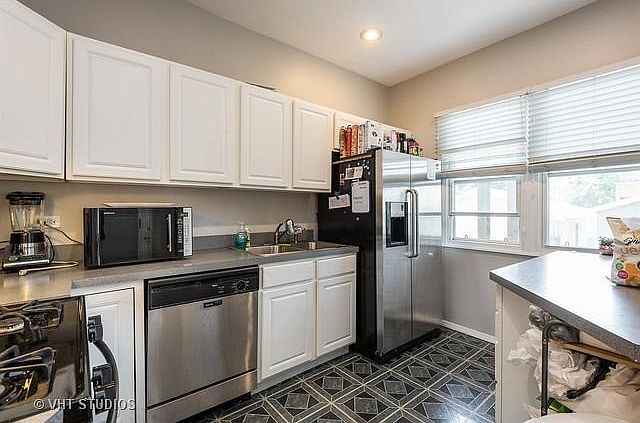 Updated kitchen with stainless steel appliances