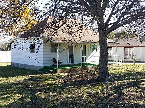 Boasts two large pecans that shade the yard and bare large fruit