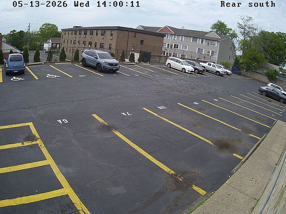 Paved parking lot with assigned space.