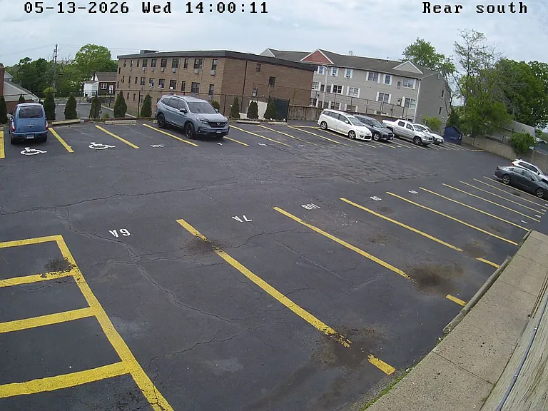 Paved parking lot with assigned space.