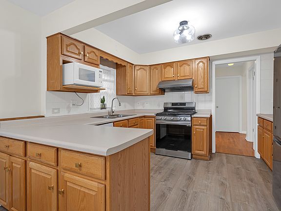 5th image of 4729 N Odell Ave