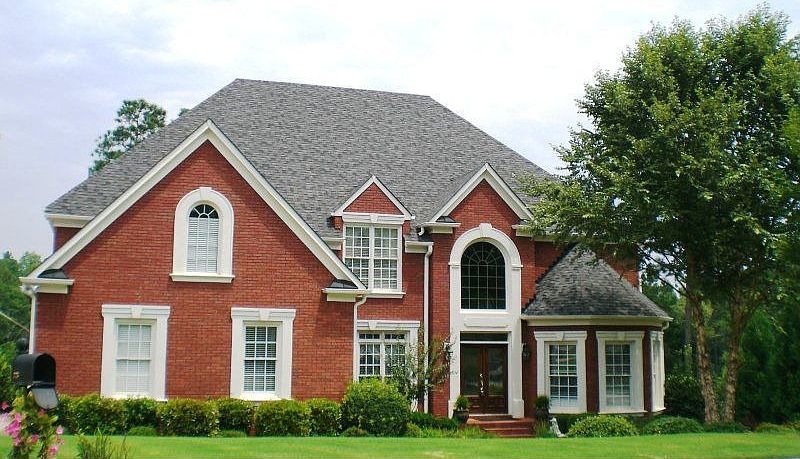 Wonderful traditional brick home w/3 car side entry garag