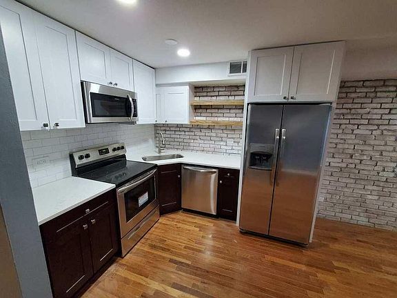 5th image of 2828 N Burling St APT 202