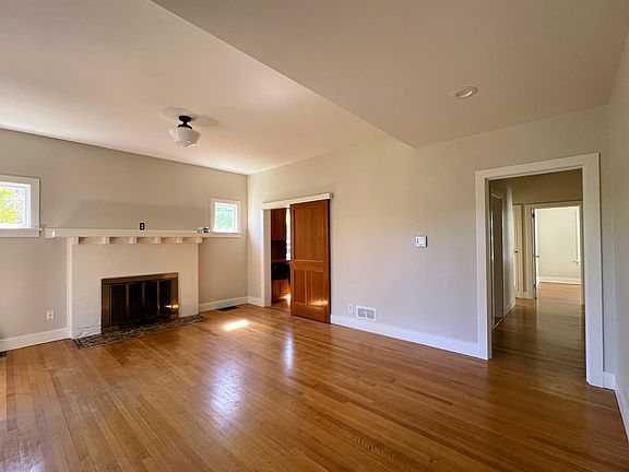 living room w/ fireplace. AC/heating controls
