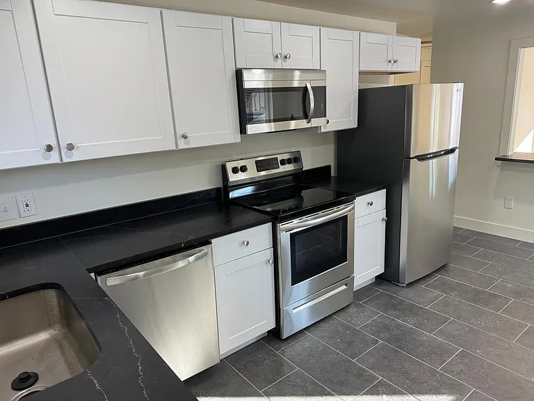 the kitchen is spacious and opens to the living room for a great room feel