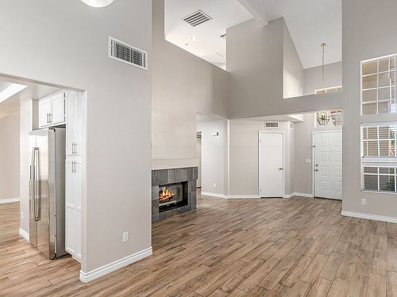 Family and Dining area, high ceilings with double sided fireplace