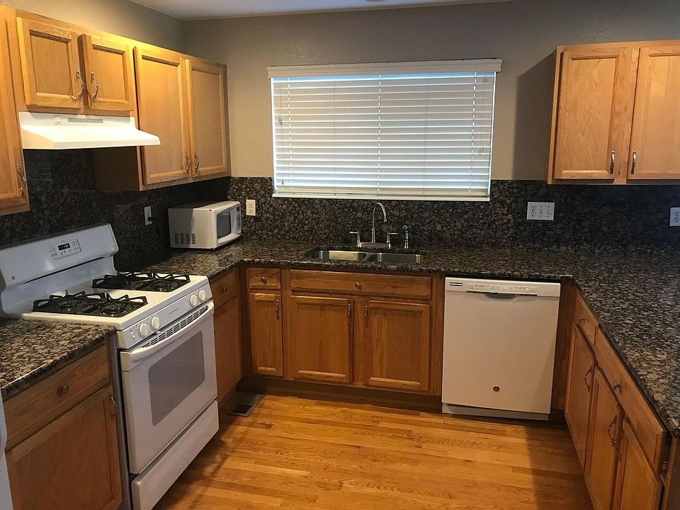 Granite countertops with hardwood floors