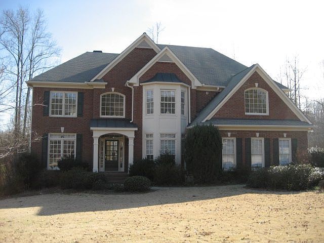 3 Sides Brick Beauty on 2.68 Acres with Over 300 Feet of River Frontage on the Chattahoochee River; 5 Bedrooms/5 Baths/Finished Terrace Level