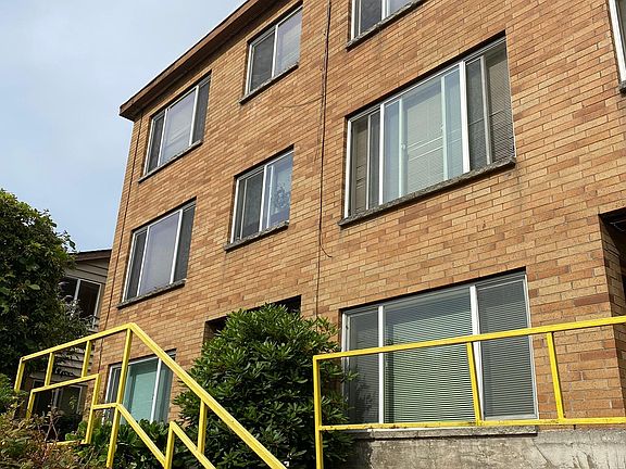 The back of the apartment building. Bus stop just down a few steps.