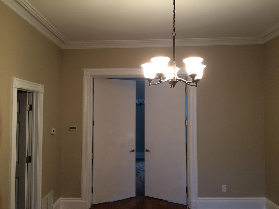 Living room with view into bedroom 1