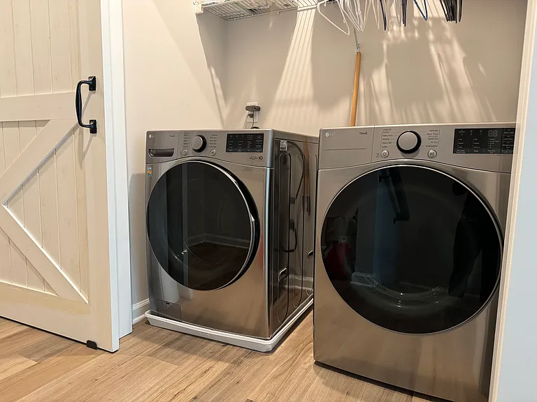 Washer and Dryer behind the barn door. Almost new Washer/dryer which was used only a handful of times