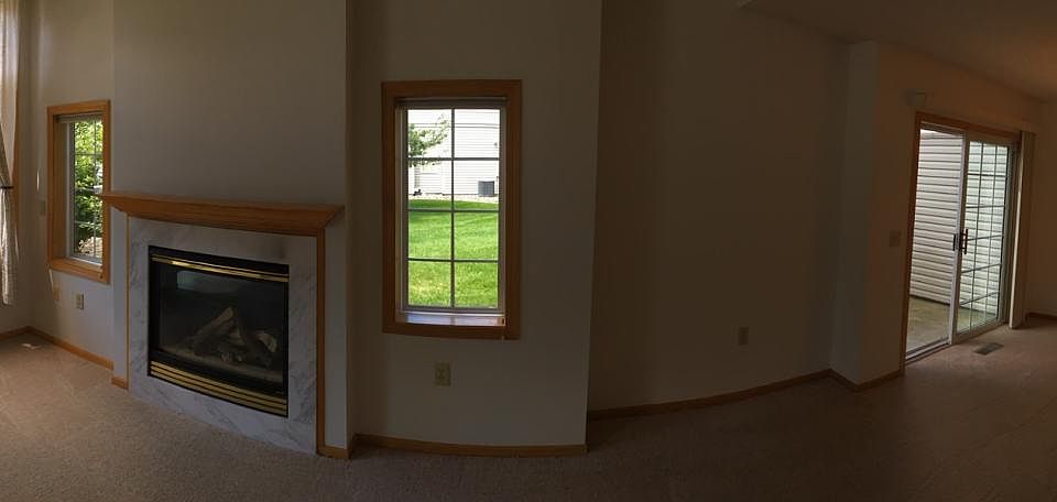 Panoramic of main level ~ a lot of windows and natural lighting.