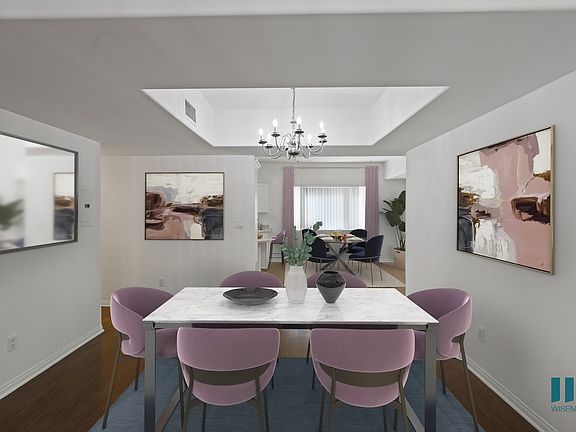 Dining Room with Chandelier and Vinyl Flooring