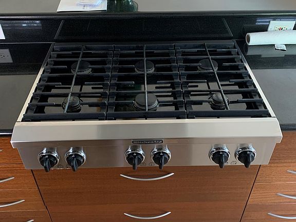 Six-burner gas stove.