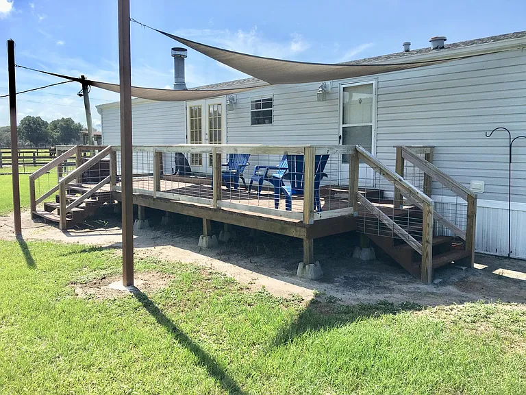 Back Covered Deck yard (new deck completely redone to include covered)