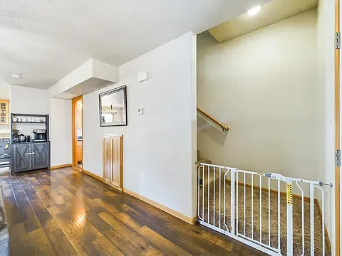Down stairs near front door