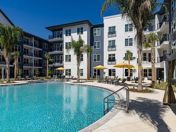 Experience upscale living with access to a stunning pool and relaxing amenities.