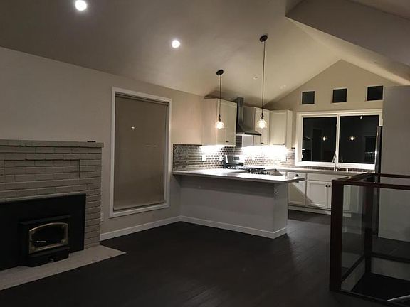 kitchen and fireplace in main living space