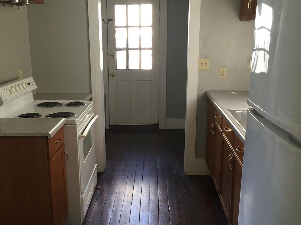 Kitchen-All Electric-Leads to Laundry Room and Exterior Access to Back Yard