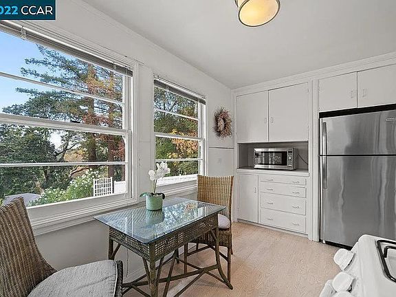 Kitchen - adjacent to living room facing front of cottage