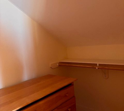 Walk in closet off master bedroom