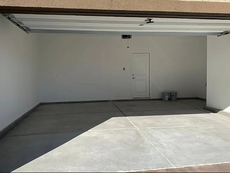 Huge two car garage with extra storage and tankless hot water heater!