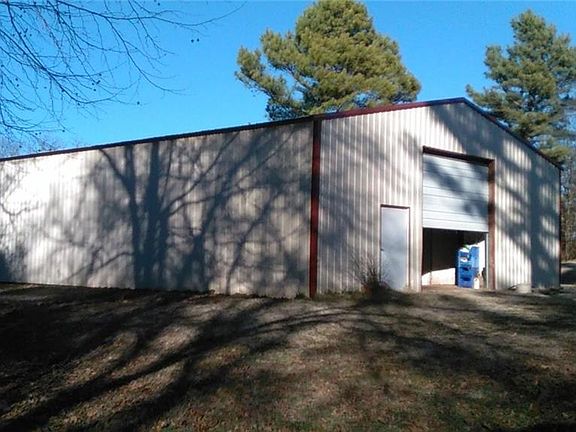Barn includes 7 horse stalls.