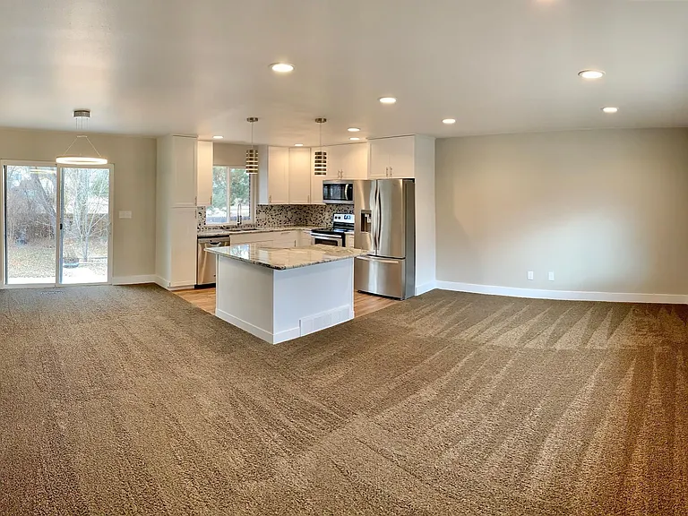 Kitchen, main living room, and dining area