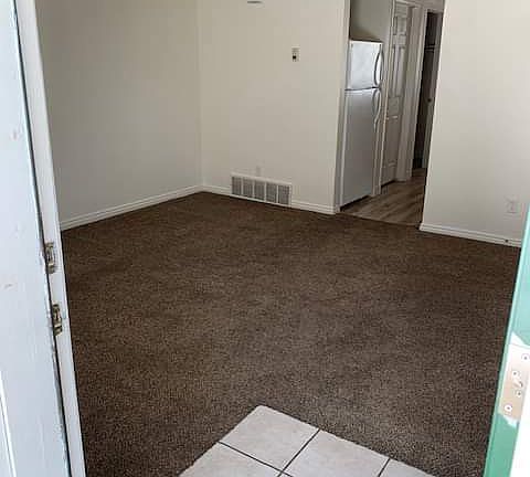 this carpet has been replaced by new LVP flooring. Professionally cleaned between every tenant. Coat and storage closet with coat hanger rack.