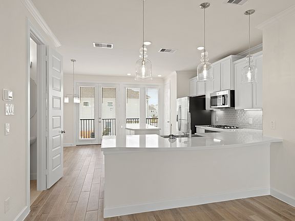 Kitchen with functional peninsula