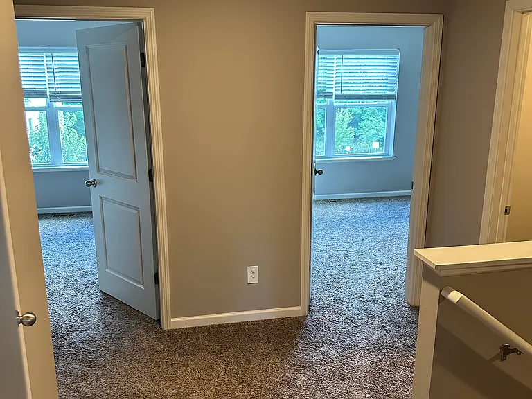 Upstairs landing with three bedrooms on this level.