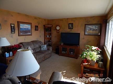 Living room
						:
						The large front window makes this living room light and bright.