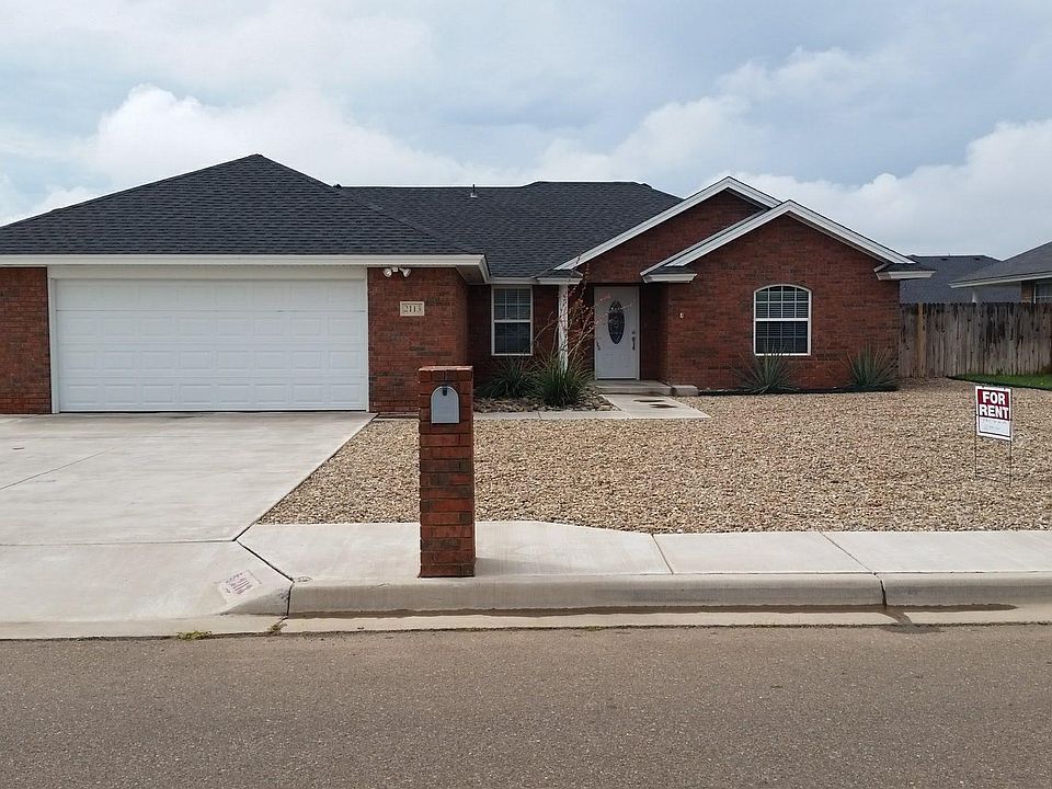 Xeriscaped front yard to help keep water bill low and less maintenance