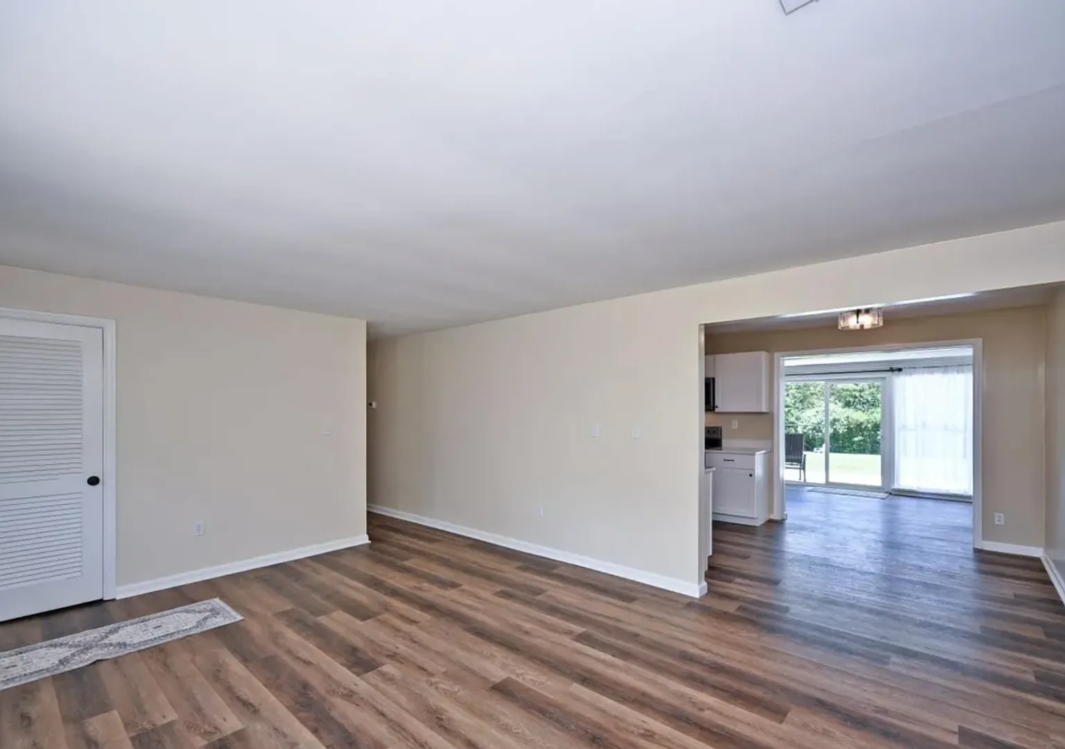 Brand-New 4-Bed Milford Home with Sunroom, Large Backyard & Patio — Photo 4
