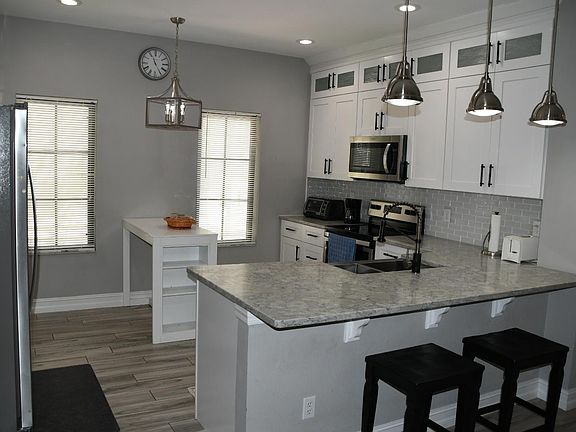 New eat-in kitchen. With cabinets up to ceiling
