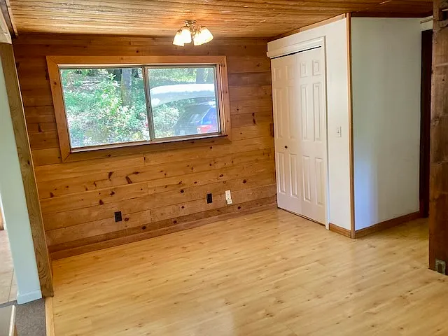 Kitchen dining area and laundry closet.