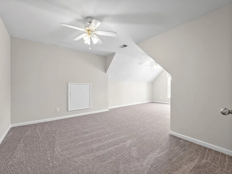 Spacious Bonus Room that could be used as a fourth bedroom or additional living space.