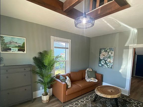 Shoe cabinet and high ceilings greet you upon entry into the house.