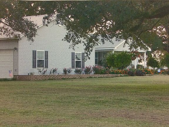 Shady oaks on home, property