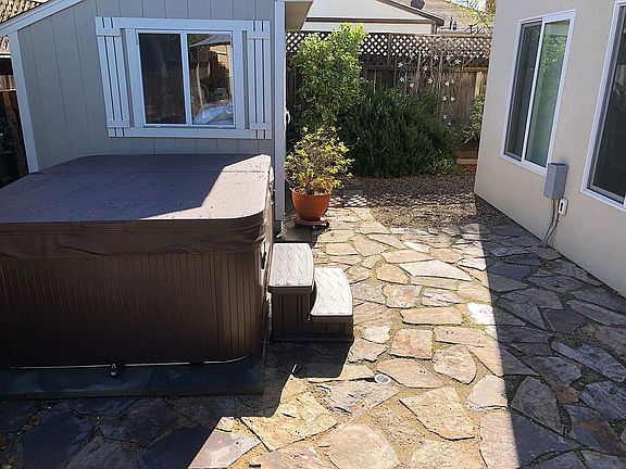 Backyard hot tub & work shed