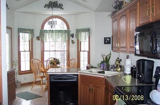 Kitchen: Sunny and bright, fully applianced oak kitchen featuring breakfast no