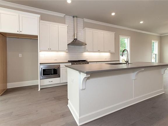 Tons of cabinets and plenty of room to move about